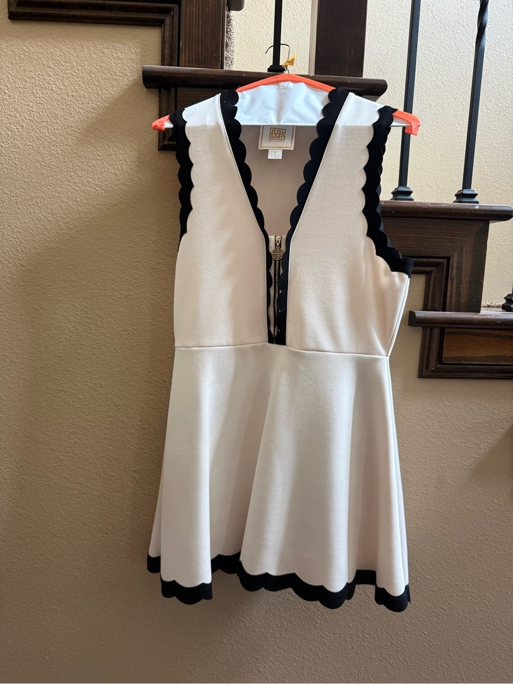 Emily McCarthy Dress. Scalloped V-Neck White Dress with Black Trim